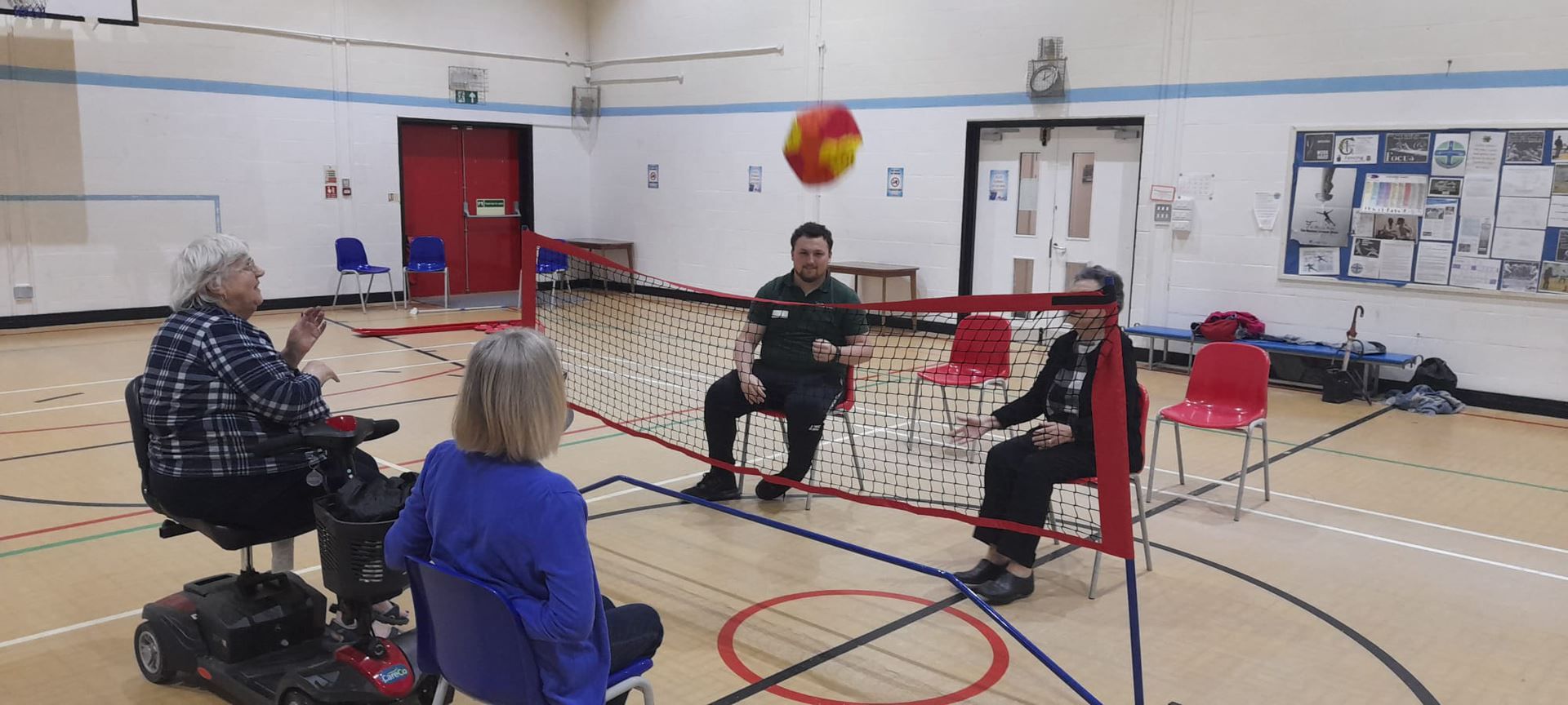 The Active ageing group playing sit down volleyball